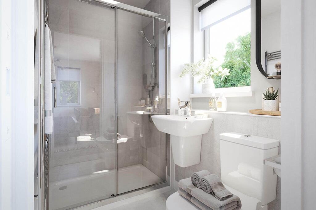 Bedroom 1 also hosts a private en suite shower room