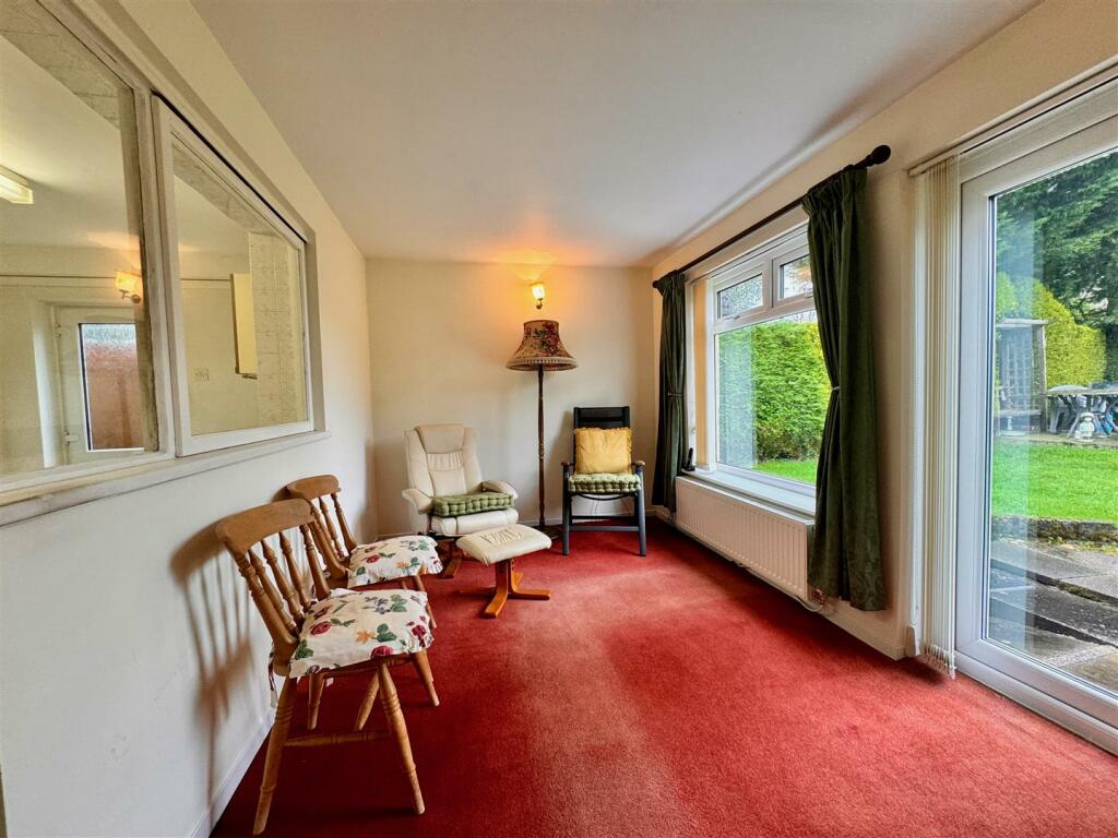 SITTING ROOM/SUN ROOM