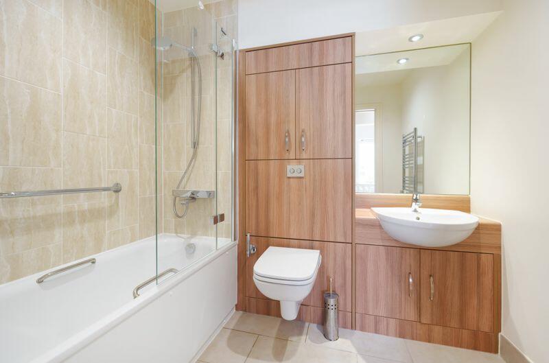 Bathroom with over-bath shower