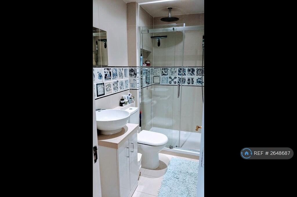 Downstairs Bathroom With Shower And Artist's Tiles