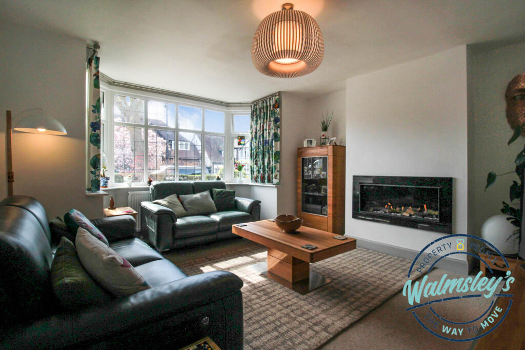 Generous sitting room with bay window