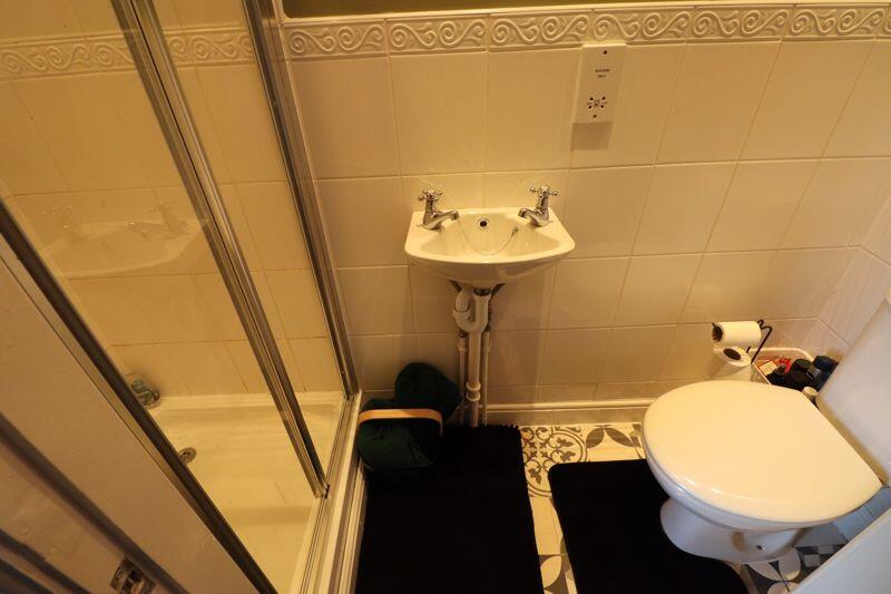 BEDROOM FOUR EN SUITE SHOWER ROOM