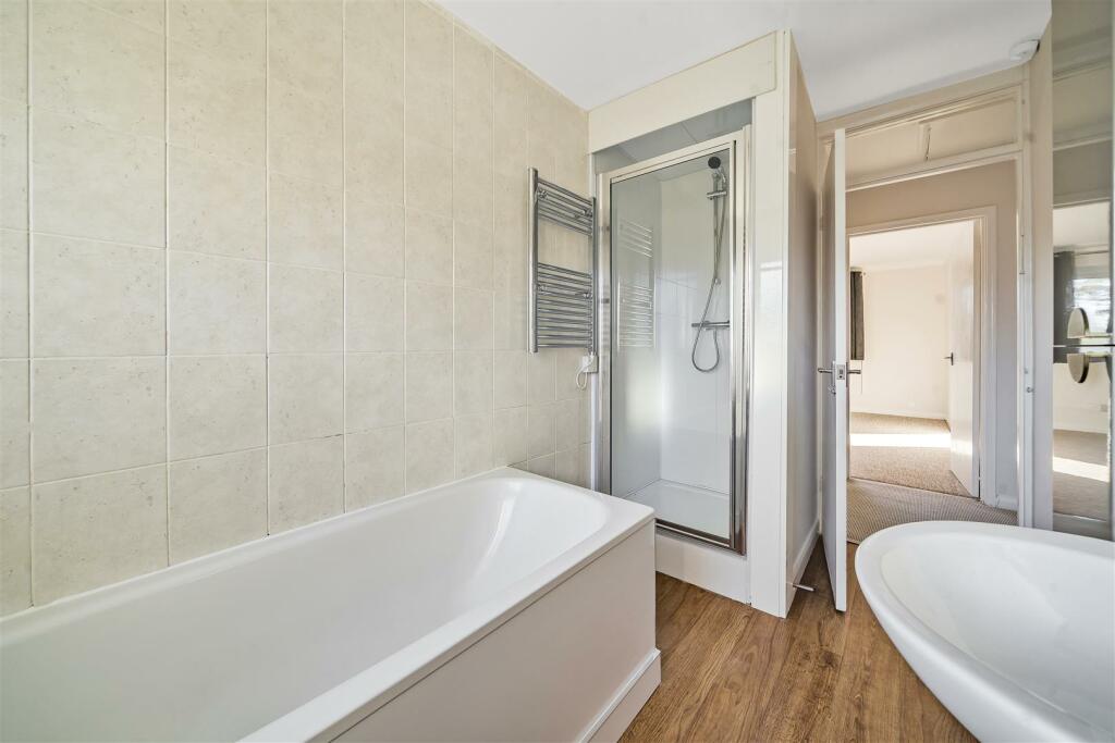 Bathroom including shower cubicle.jpg