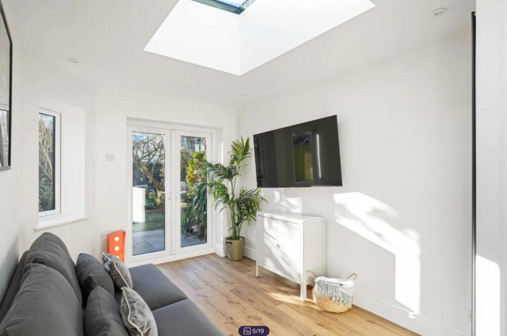 A bright and spacious modern living room with l...