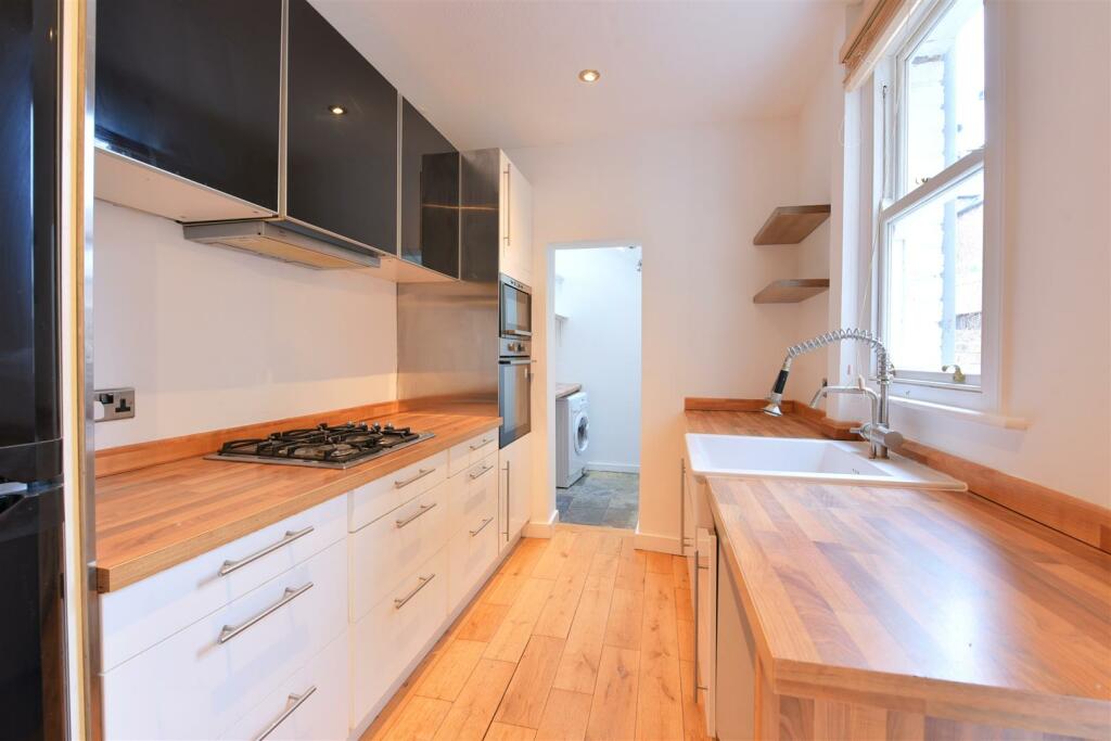 Kitchen with utility area