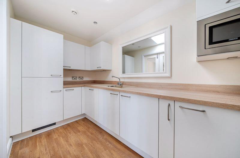 Kitchen with built-in appliances