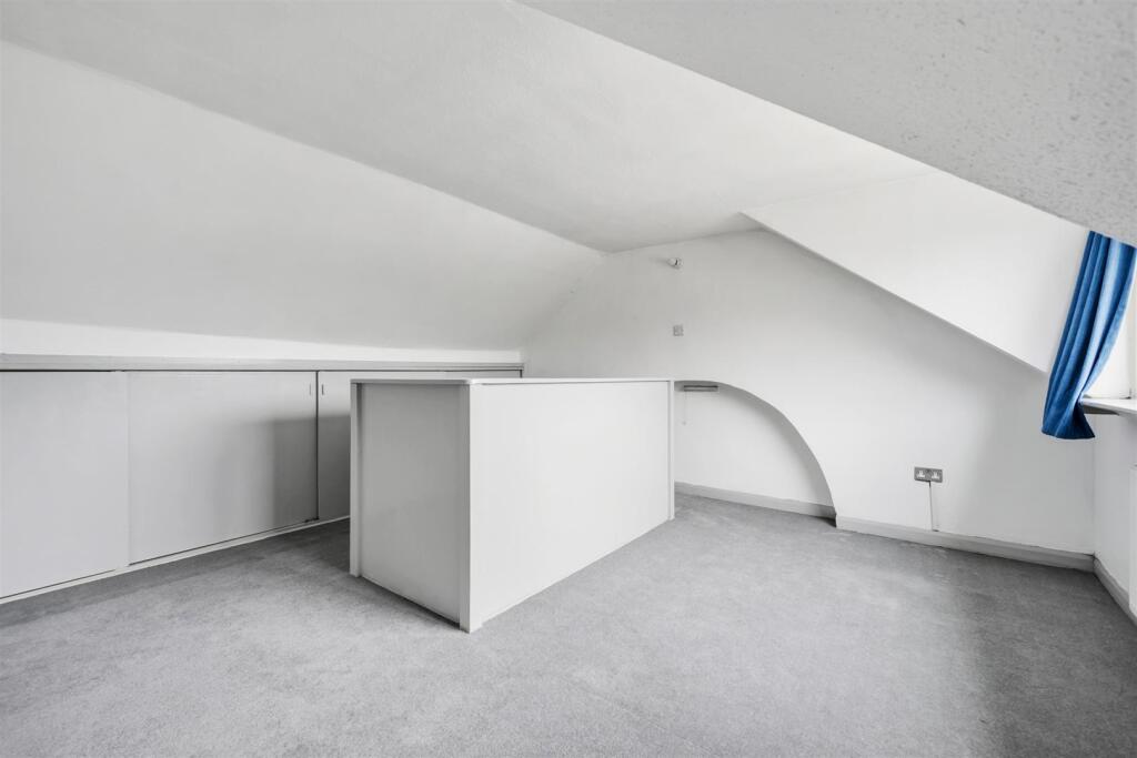 Loft Room to staircase and arch.jpg