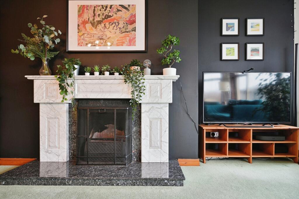 Feature an open fire surround