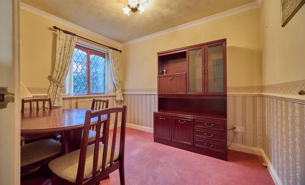 DINING ROOM/FAMILY ROOM TO FRONT