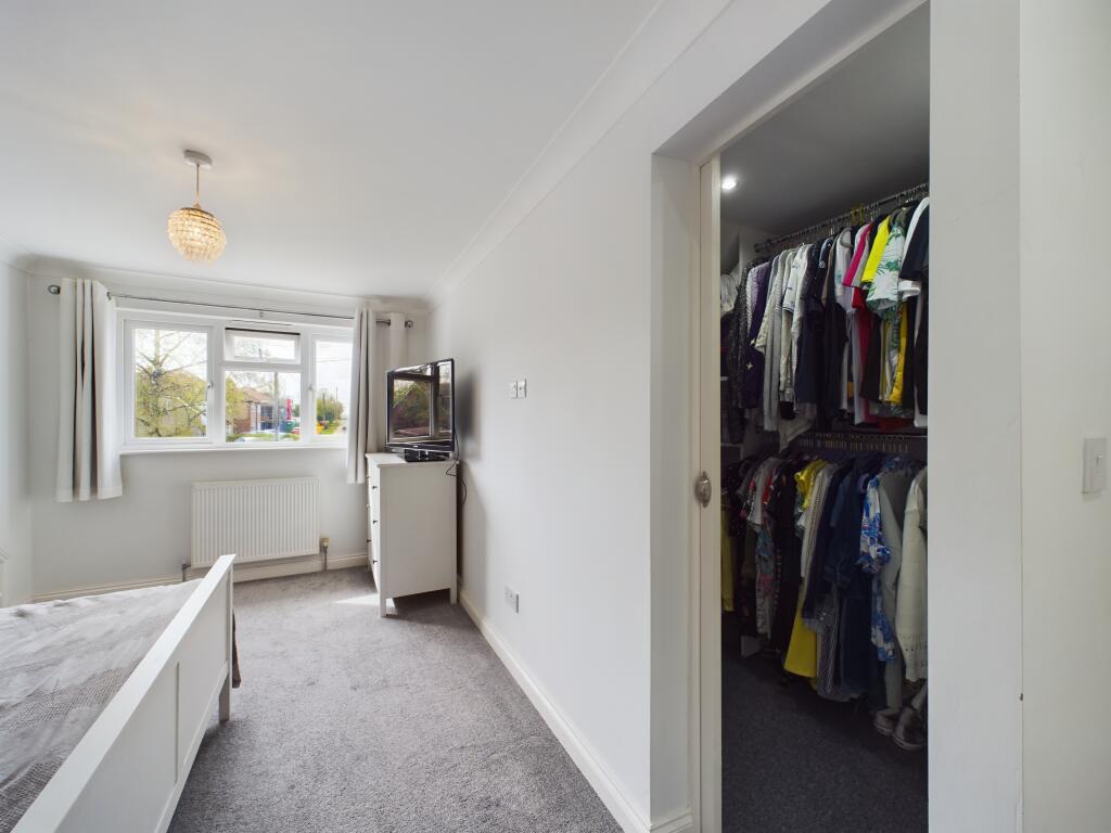bedroom one with walk in wardrobe