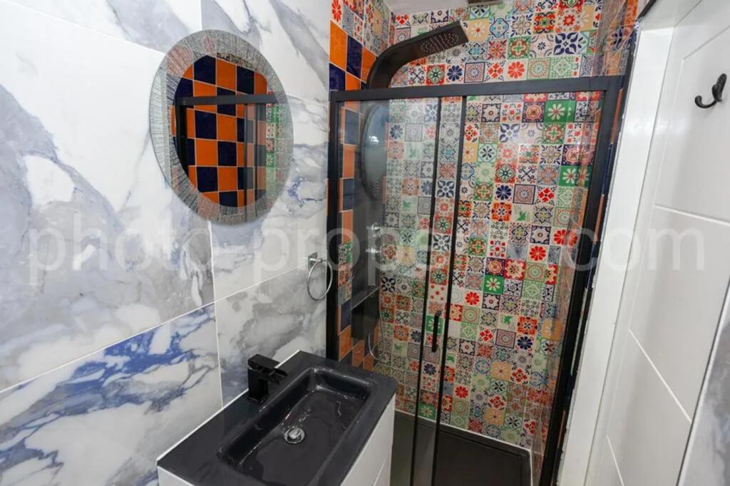 A beautifully designed bathroom featuring vibra...