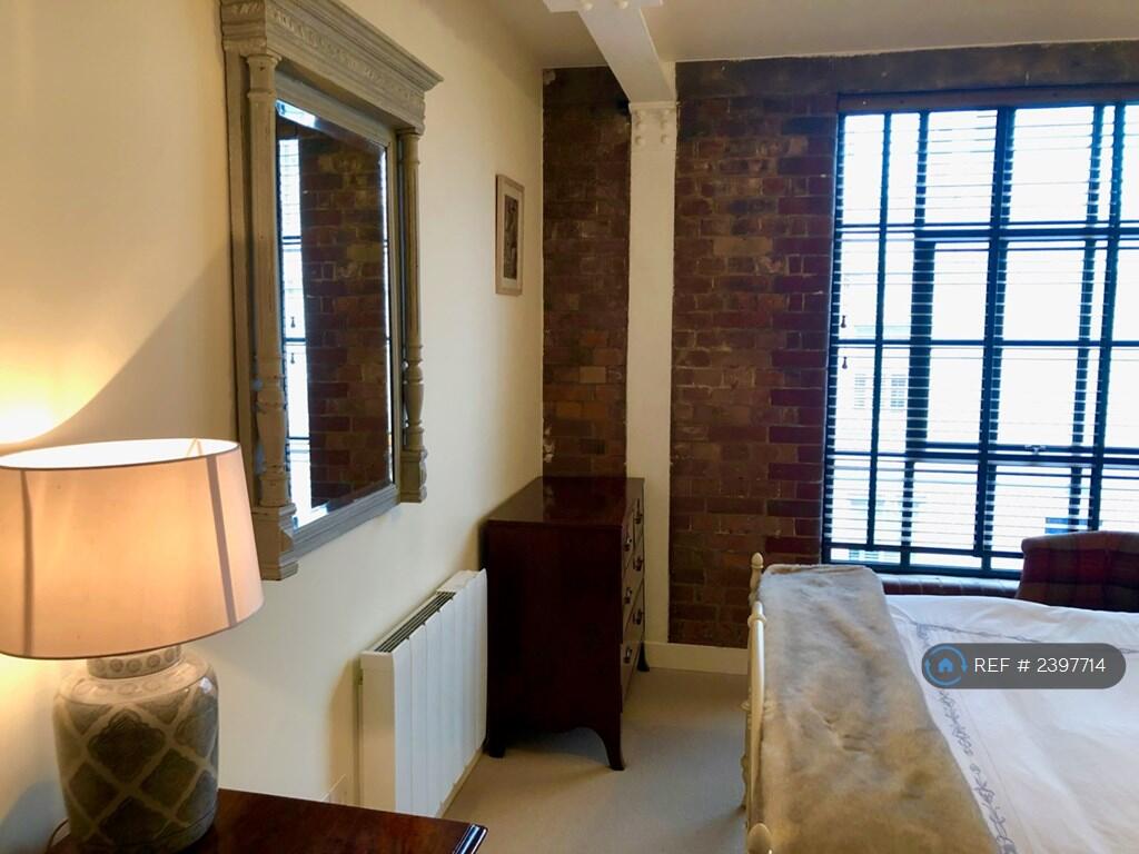 Exposed Red Brick Exterior Wall