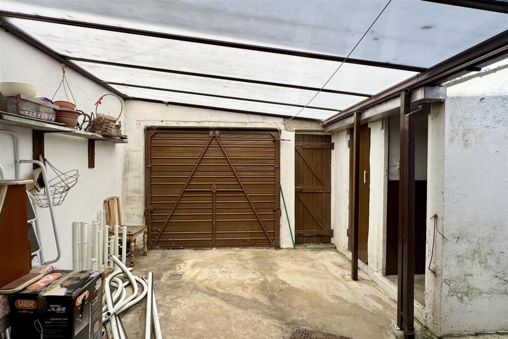 Rear Yard with Carport