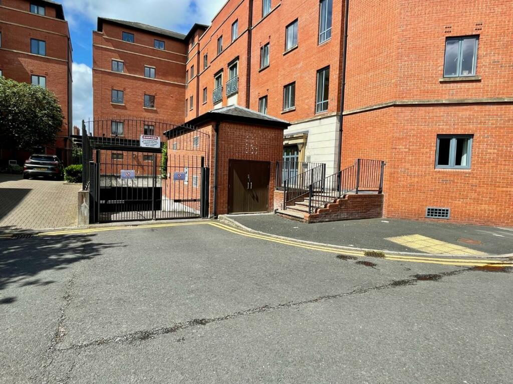 GATED ENTRANCE TO CAR PARK