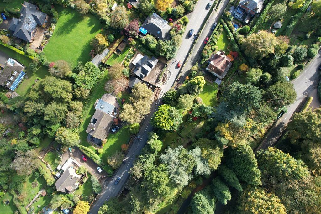 Large plot with garage at one end