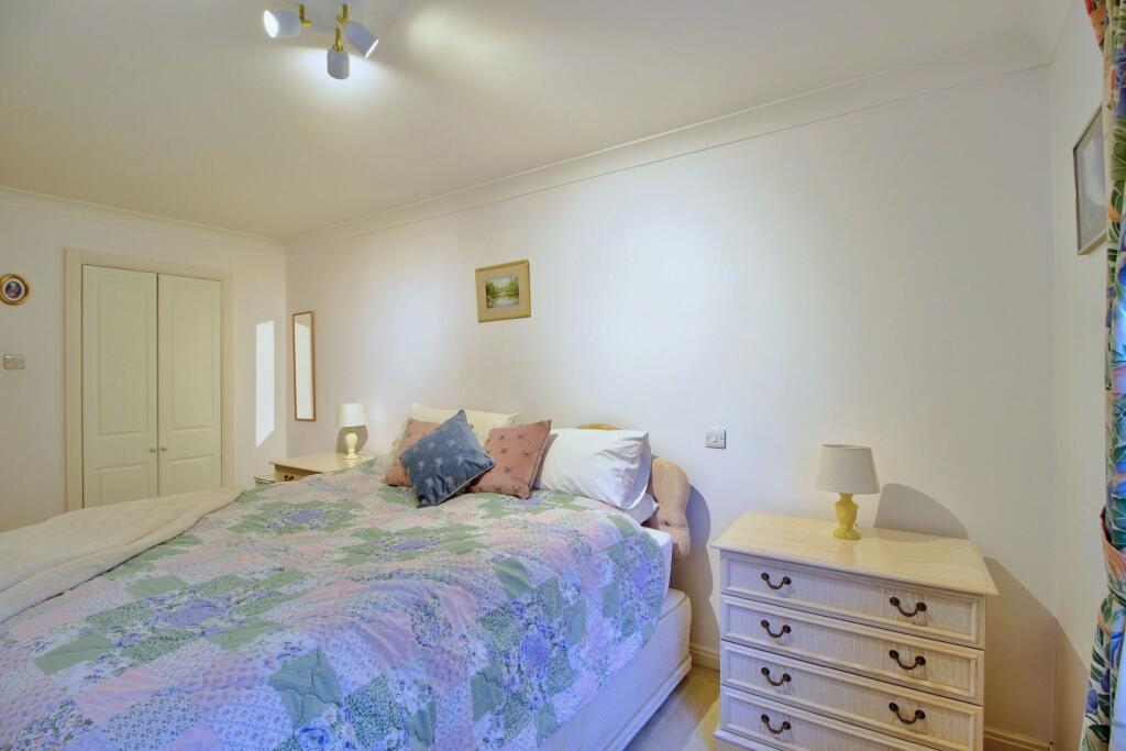 Bedroom Two with built-in wardrobe