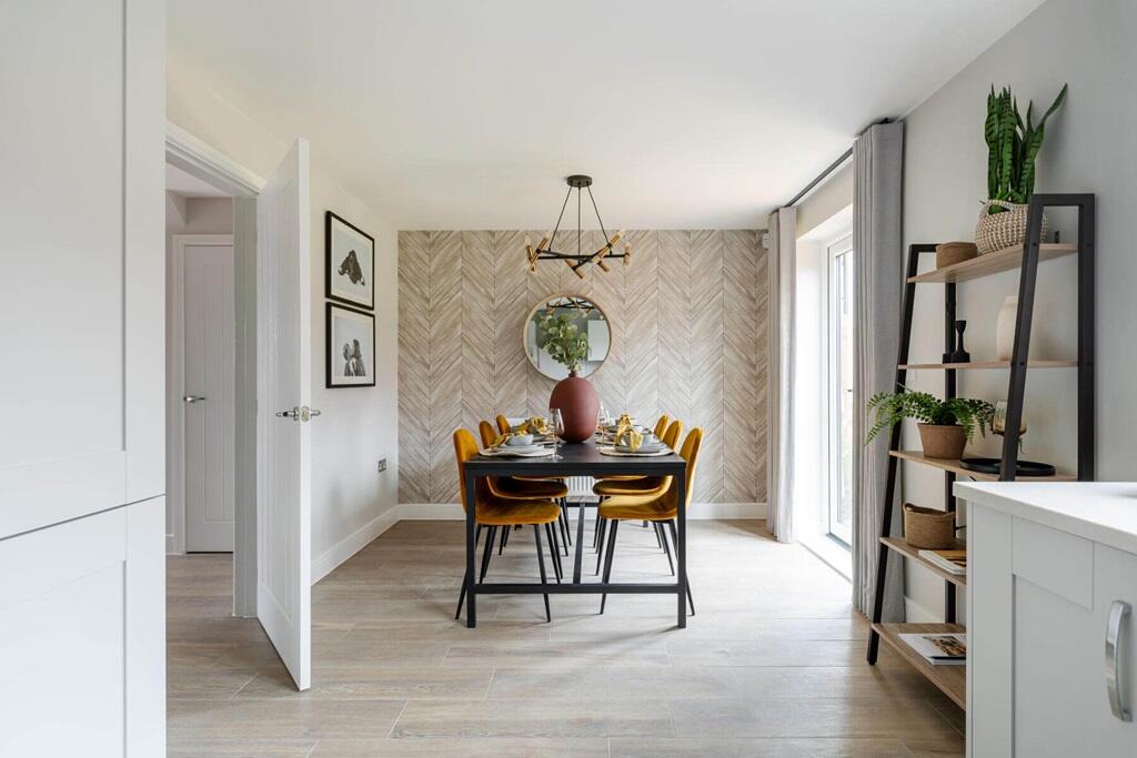 Double doors lead from the dining area to the garden