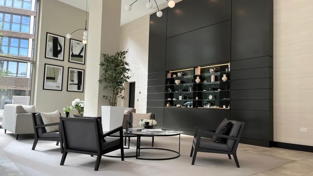 A stylish and spacious reception area featuring...