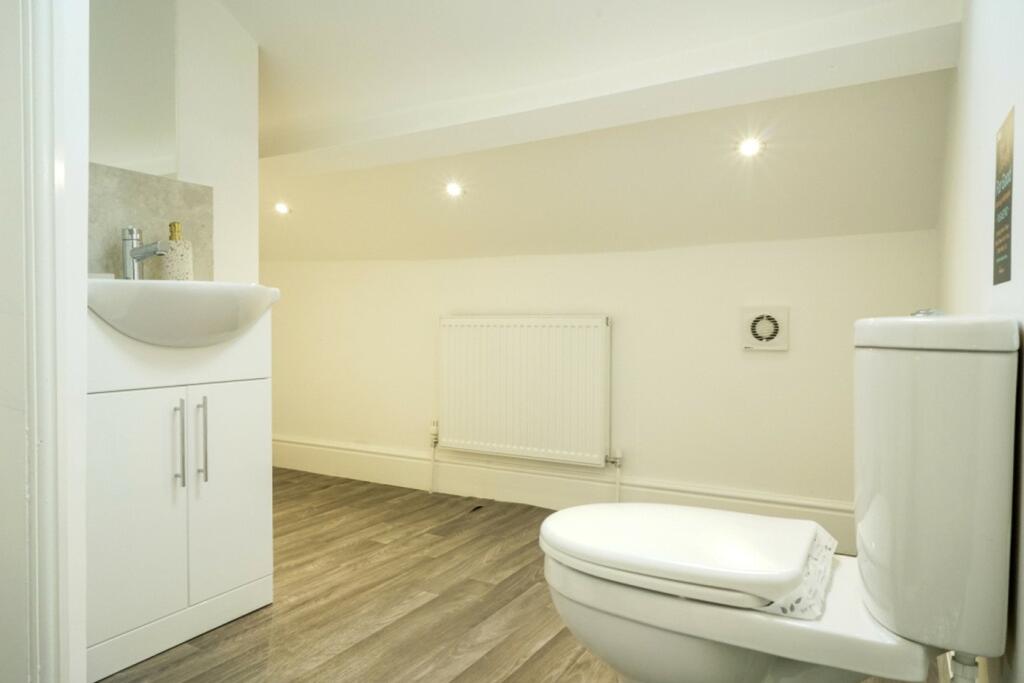 A modern and clean bathroom with stylish fixtur...