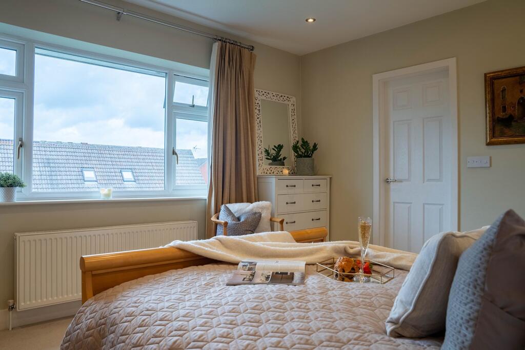 Large window in the master bedroom