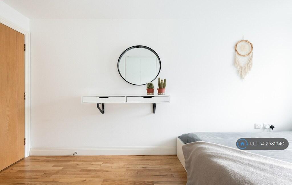 Large Bedroom With a Spacious Built-In Wardrobe