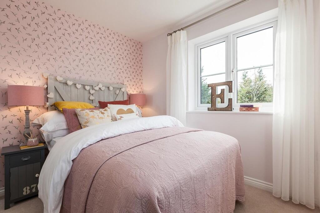 A second double bedroom that welcomes plenty of natural light