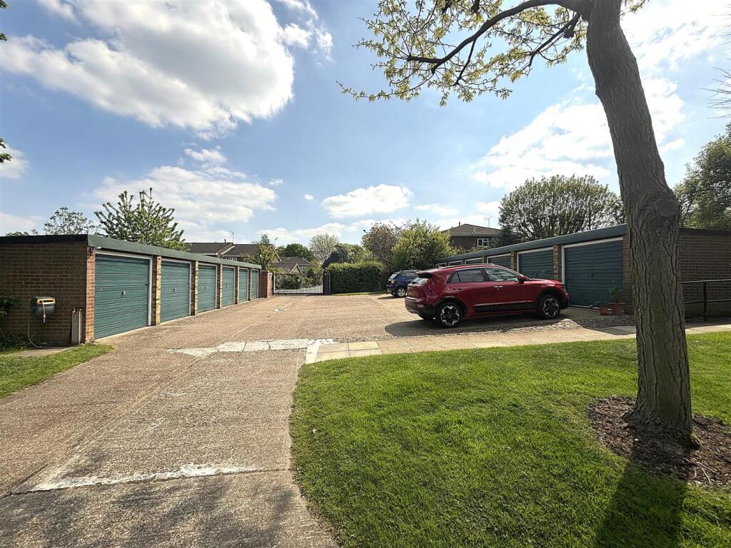COMMUNAL GROUNDS &amp; GARAGE