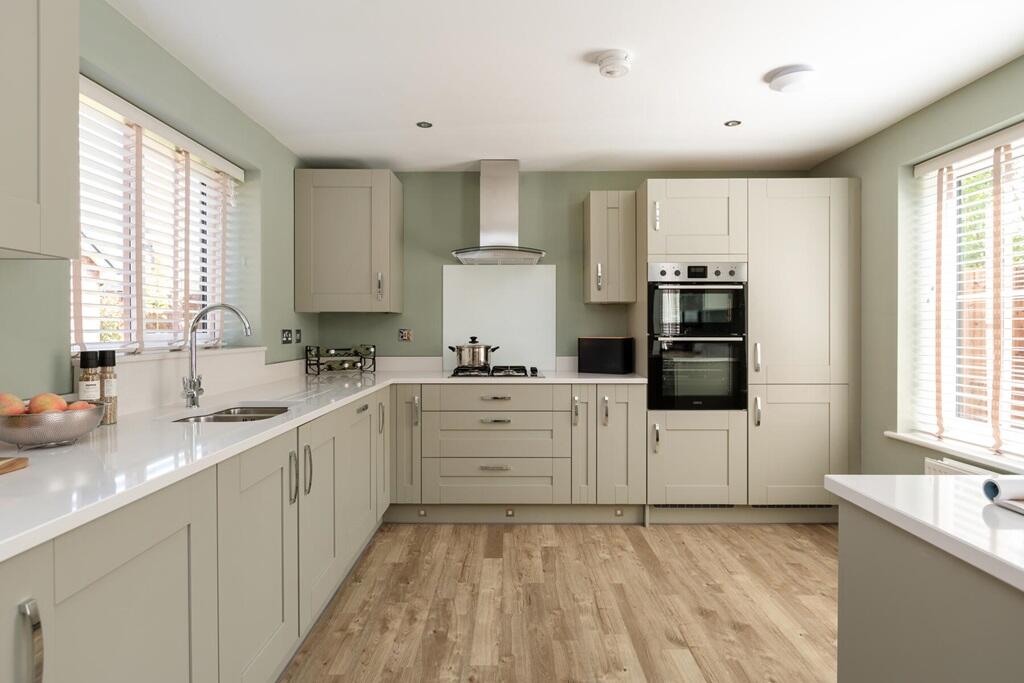 A large kitchen diner with French doors to the garden