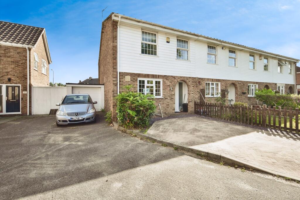 Front View Of The Property With Driveway Parking