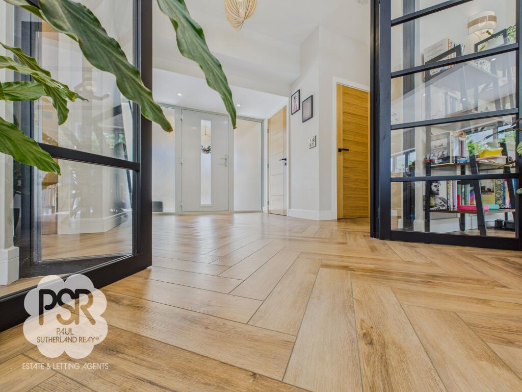 Sumptuous Herringbone Floored Hallway
