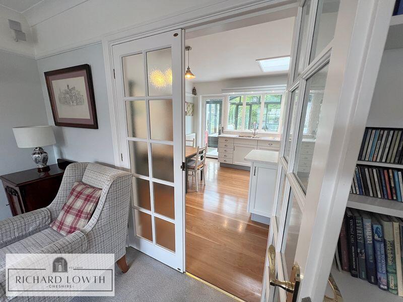 Lounge Opening into Kitchen