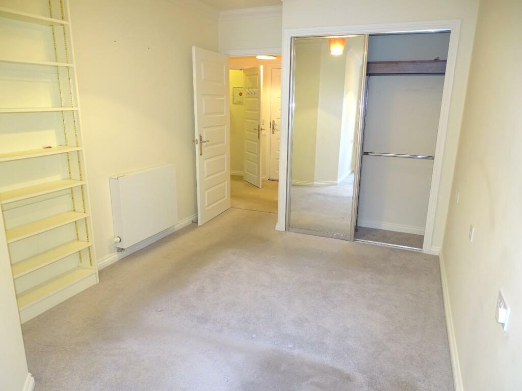 BUILT IN MIRRORED WARDROBES