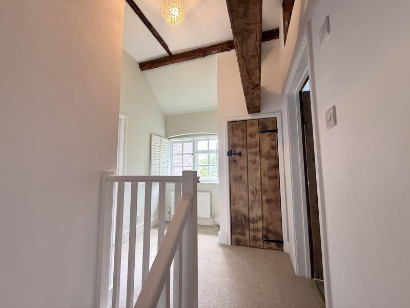 Wooden beams on landing