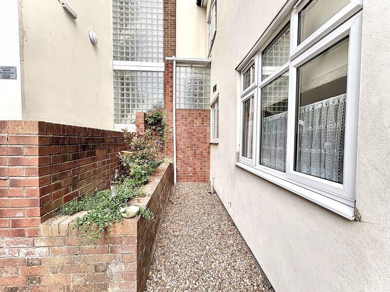 ENTRANCE/SMALL GARDEN AREA