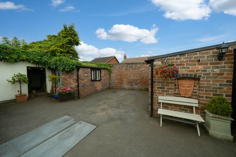 SECURE COURTYARD/DRIVEWAY