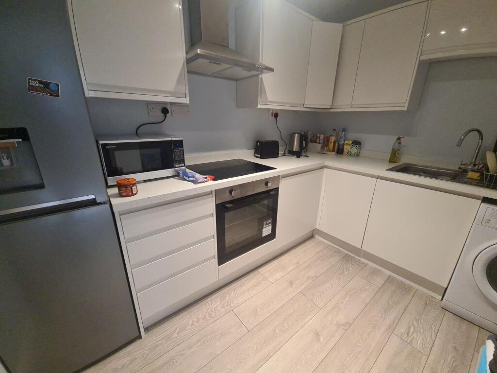 A modern and well-maintained kitchen featuring ...