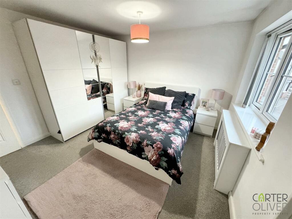 BEDROOM 1 (FRONT)