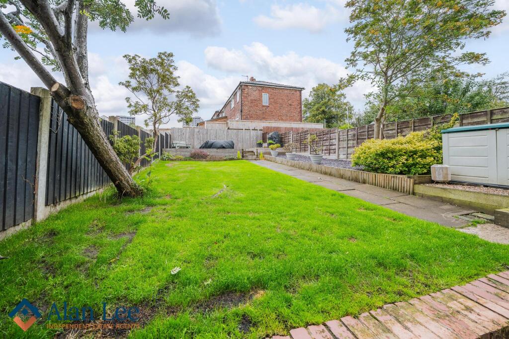 Garden with Raised Patio Area