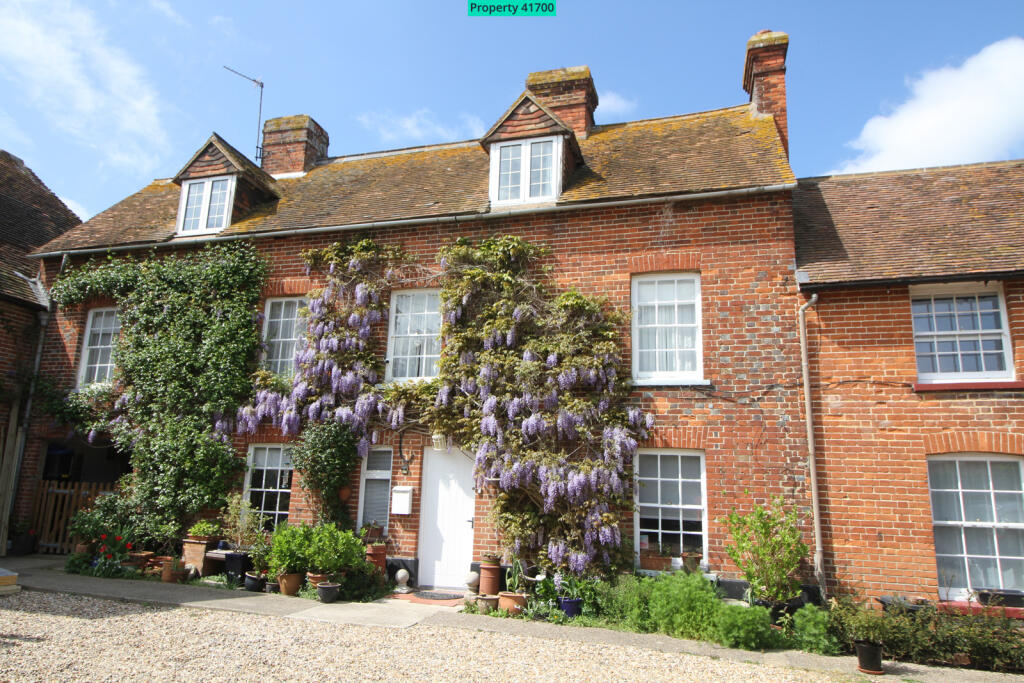 The largest of 3 cottages in the courtyard