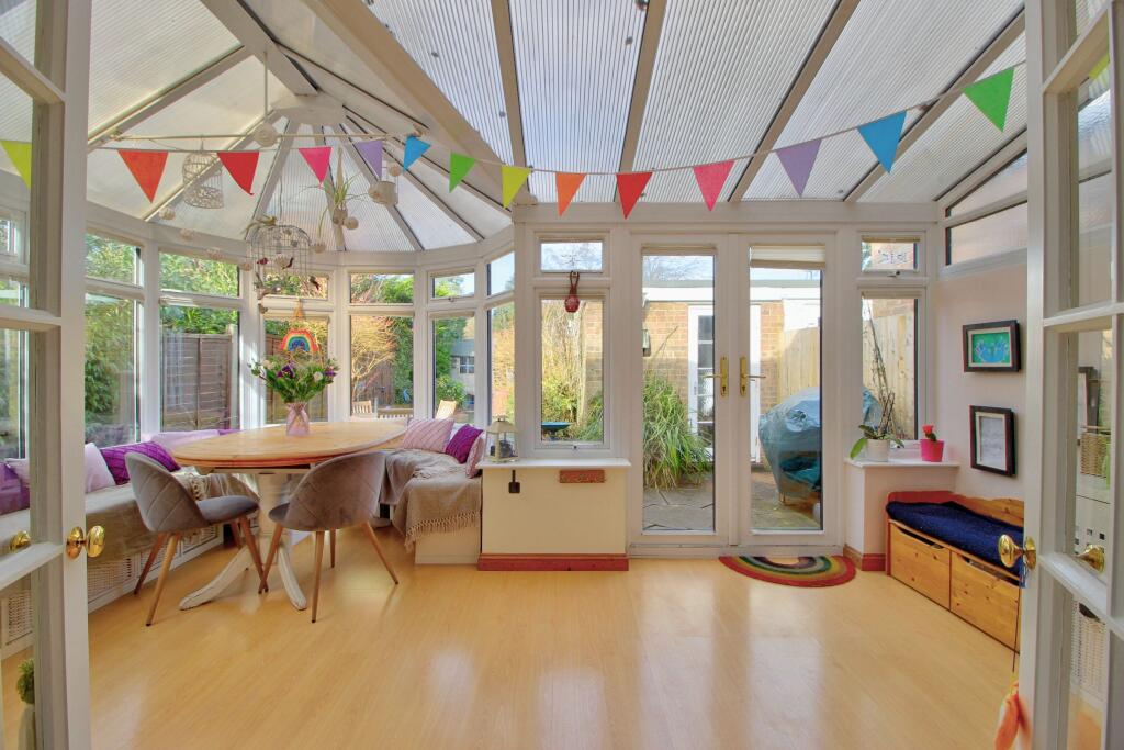 Conservatory opens to enclosed garden