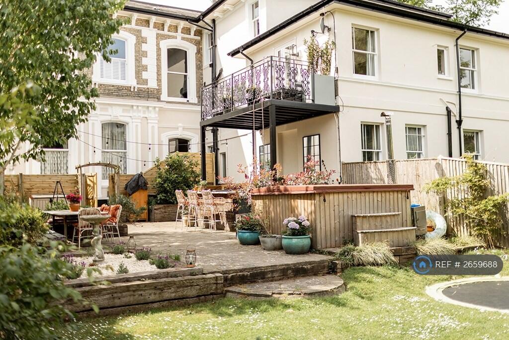 View Of Outside Kitchen From Garden.