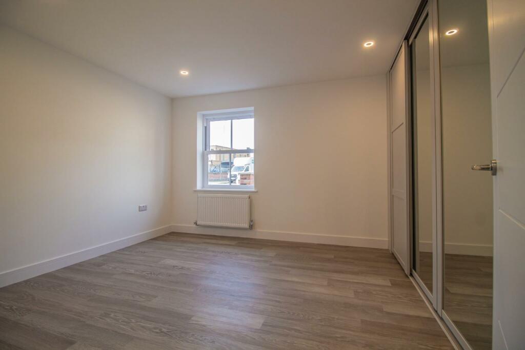 Apartment 1_Saddler's Court [Bedroom One] 01.jpg