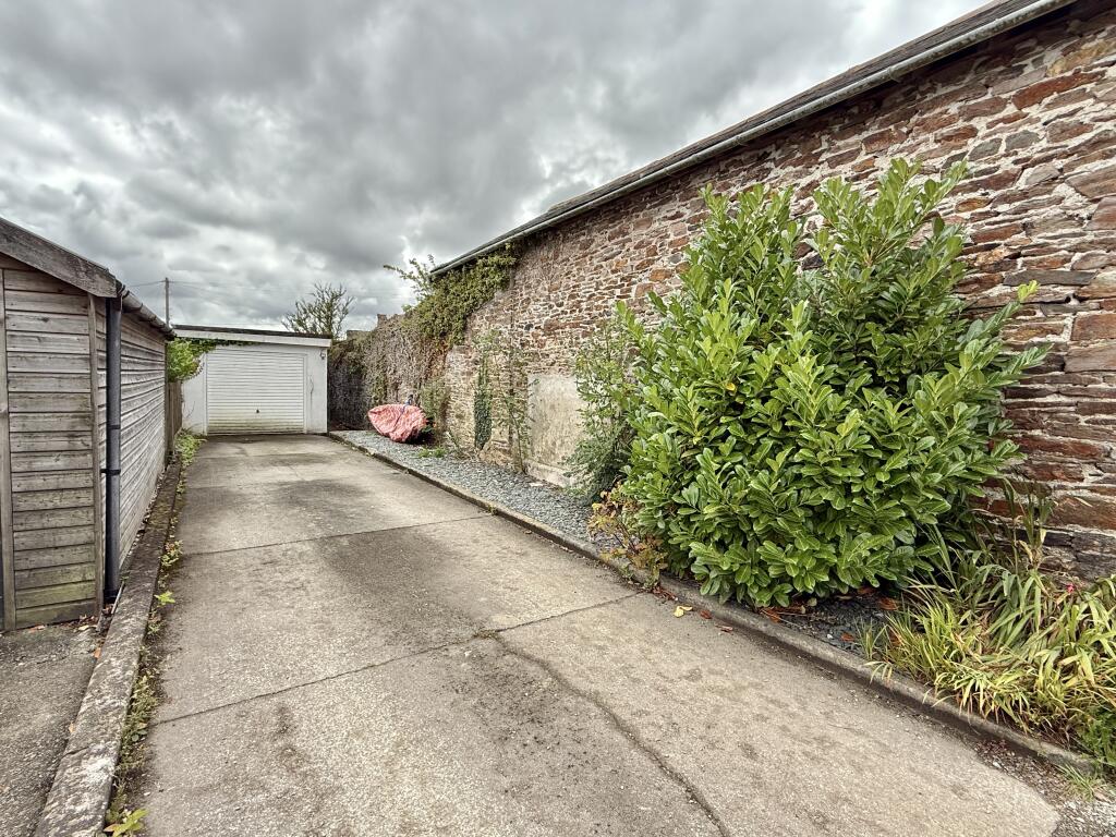 Parking for 3 Cars + Garage