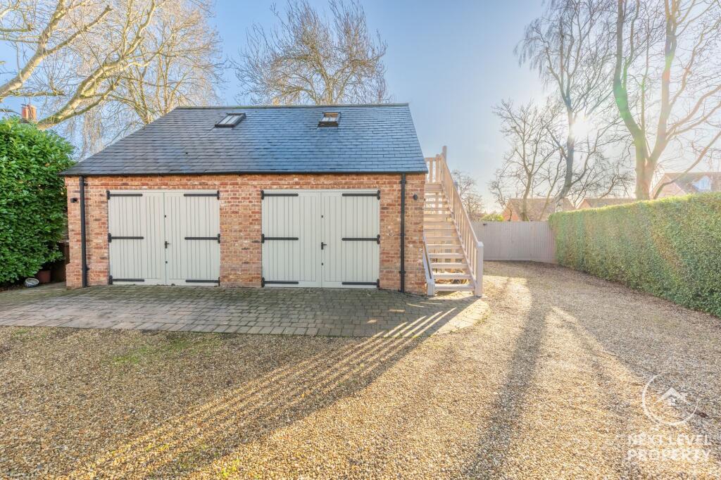 Double garage with room over