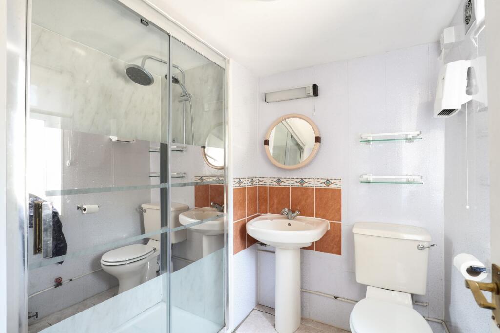 Downstairs WC &amp; Shower Room