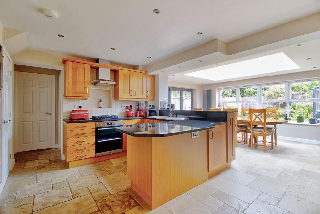 With breakfast bar and ergonomic layout