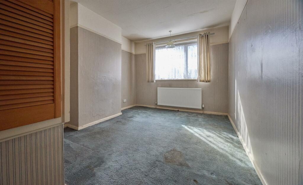 BEDROOM TWO TO REAR