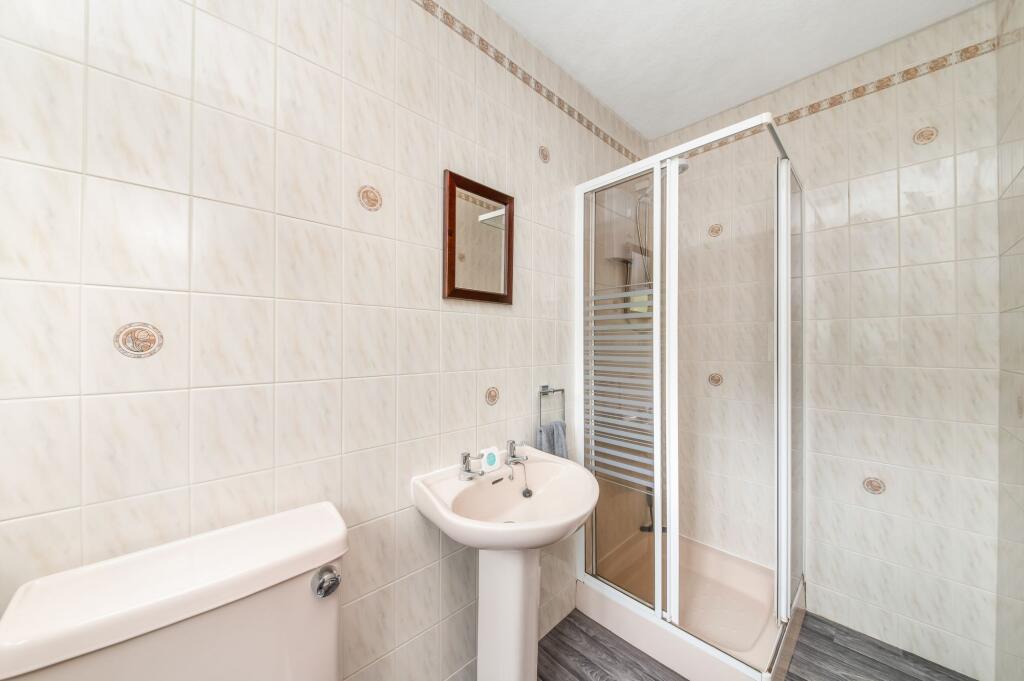 BEDROOM ONE EN-SUITE SHOWER ROOM