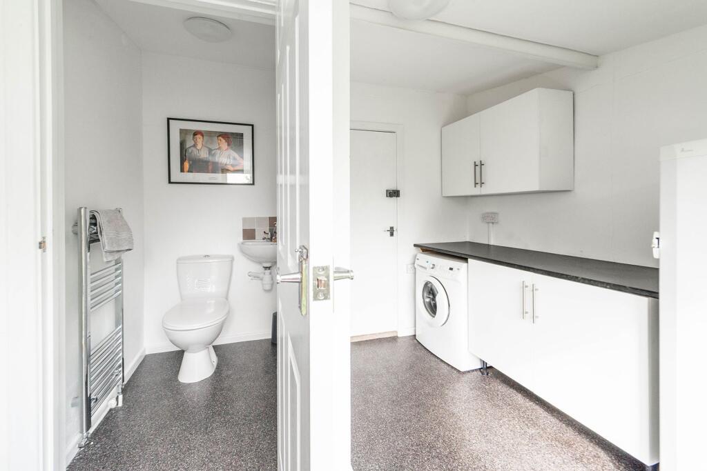 UTILITY ROOM AND WC