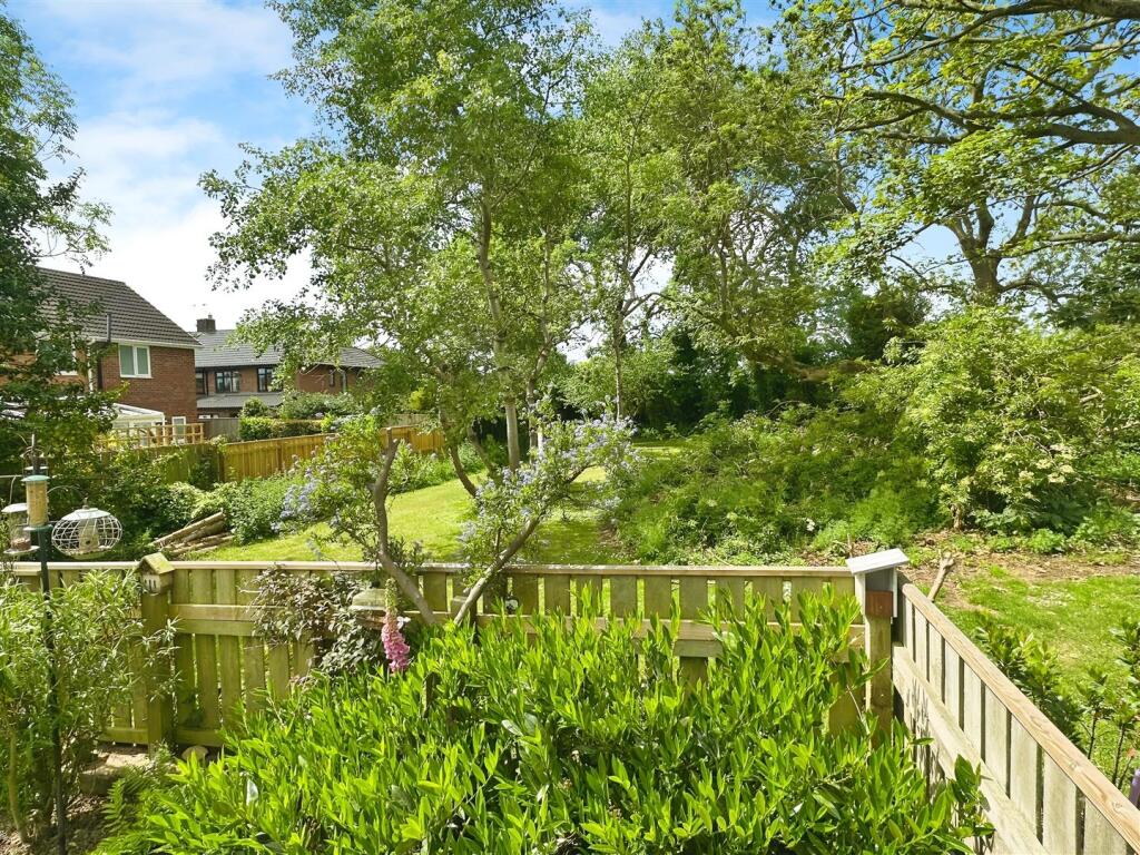 OUTLOOK TO SIDE OF PROPERTY